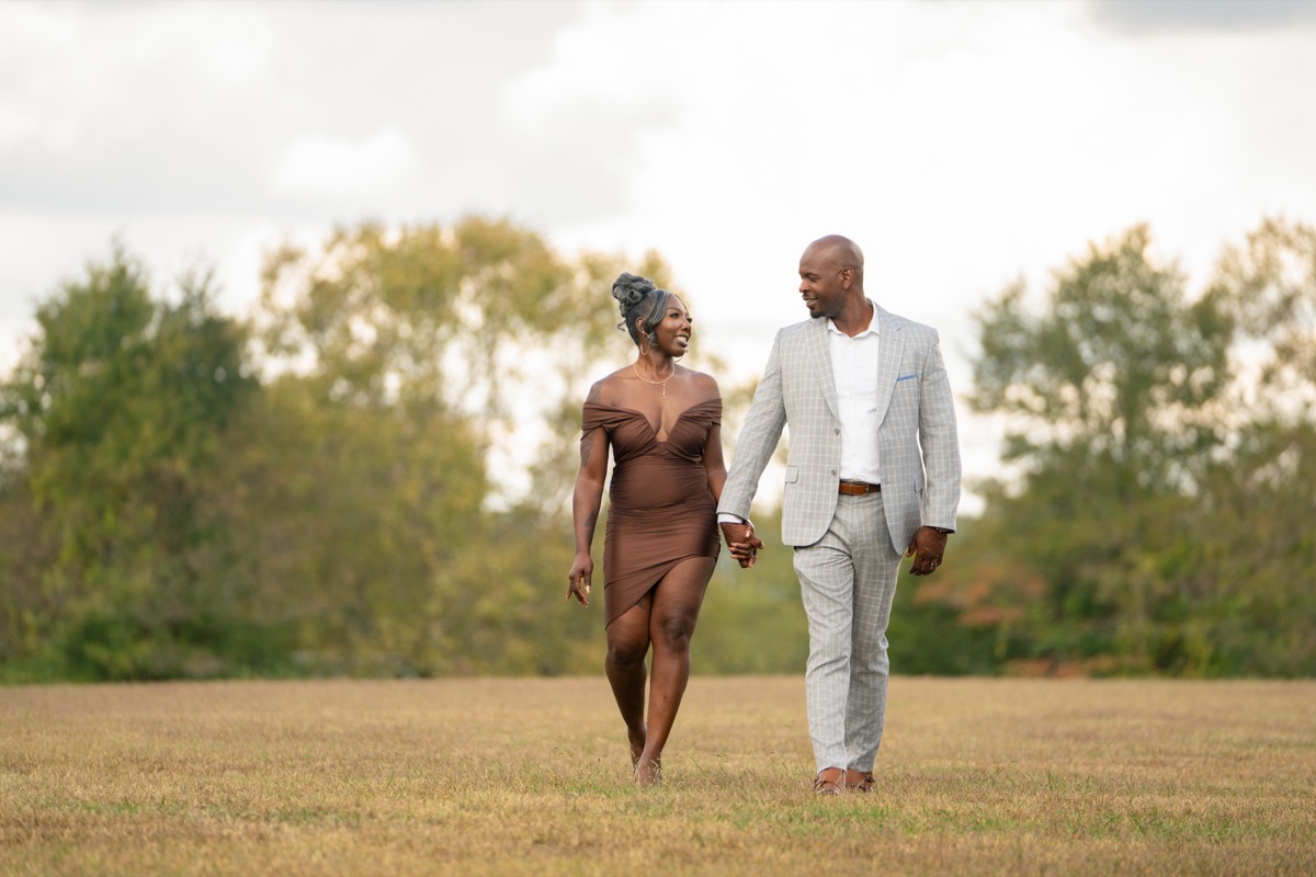 Dwayne and Samantha Williams walking hand in hand